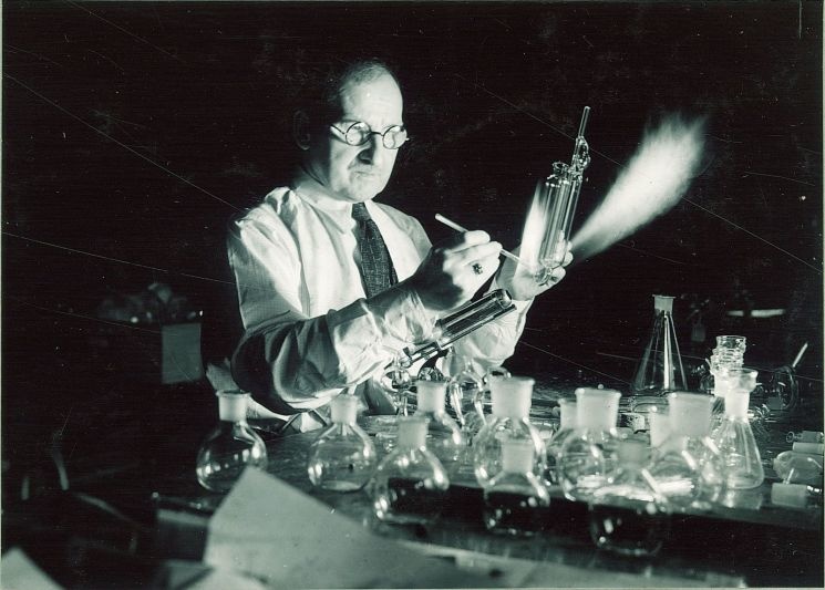 Herman Wiegand at bench. making Chemistry lab-wire